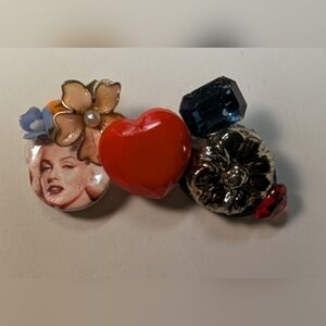 Wendy Gell Marilyn Monroe brooch with heart Swarovski stars flowers.